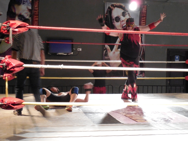 Lucha libre action in the ring. Photo © Lorraine Caputo